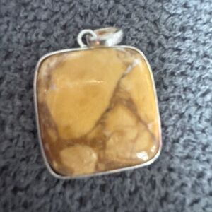 Elegant Gold-Tone Pendant